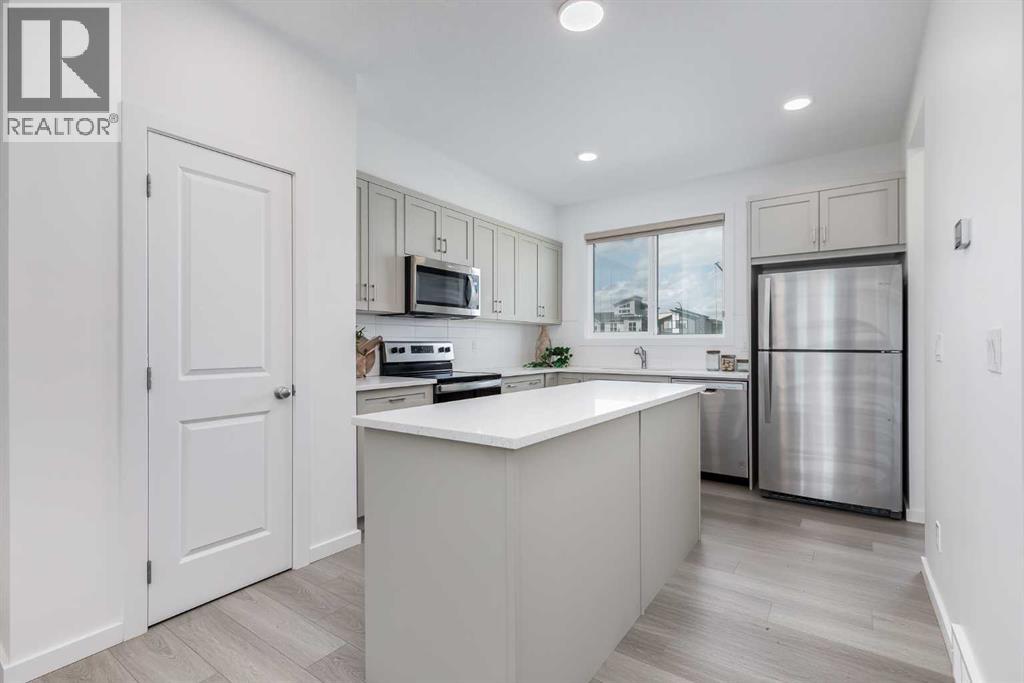 Single Family House for Sale in  Belmont Drive SW Belmont Calgary 