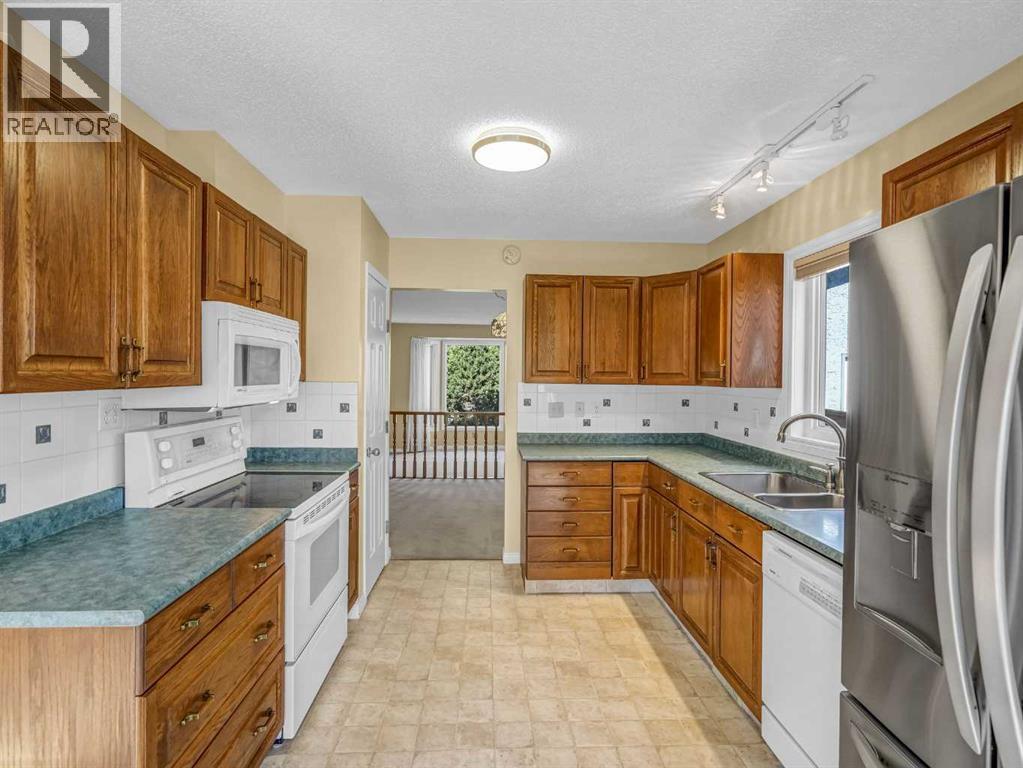 Single Family House Bungalow for Sale in  Wood Valley Rise SW Woodbine Calgary 