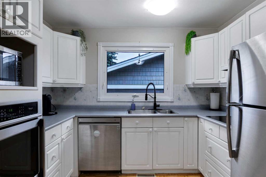 Single Family House Bungalow for Sale in  Cannell Road SW Canyon Meadows Calgary 