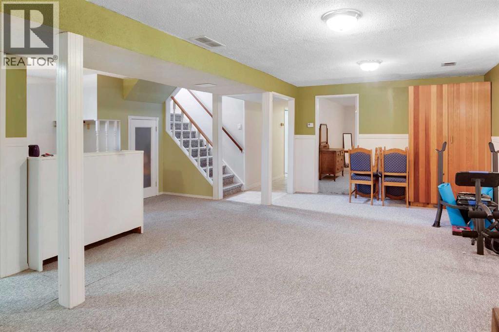 Single Family House Bungalow for Sale in  Cannell Road SW Canyon Meadows Calgary 