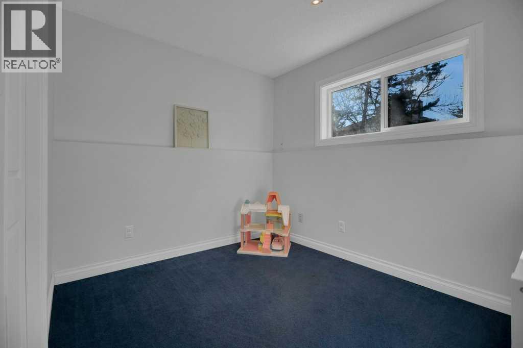 Single Family House 4 Level for Sale in  Mckerrell Crescent SE McKenzie Lake Calgary 