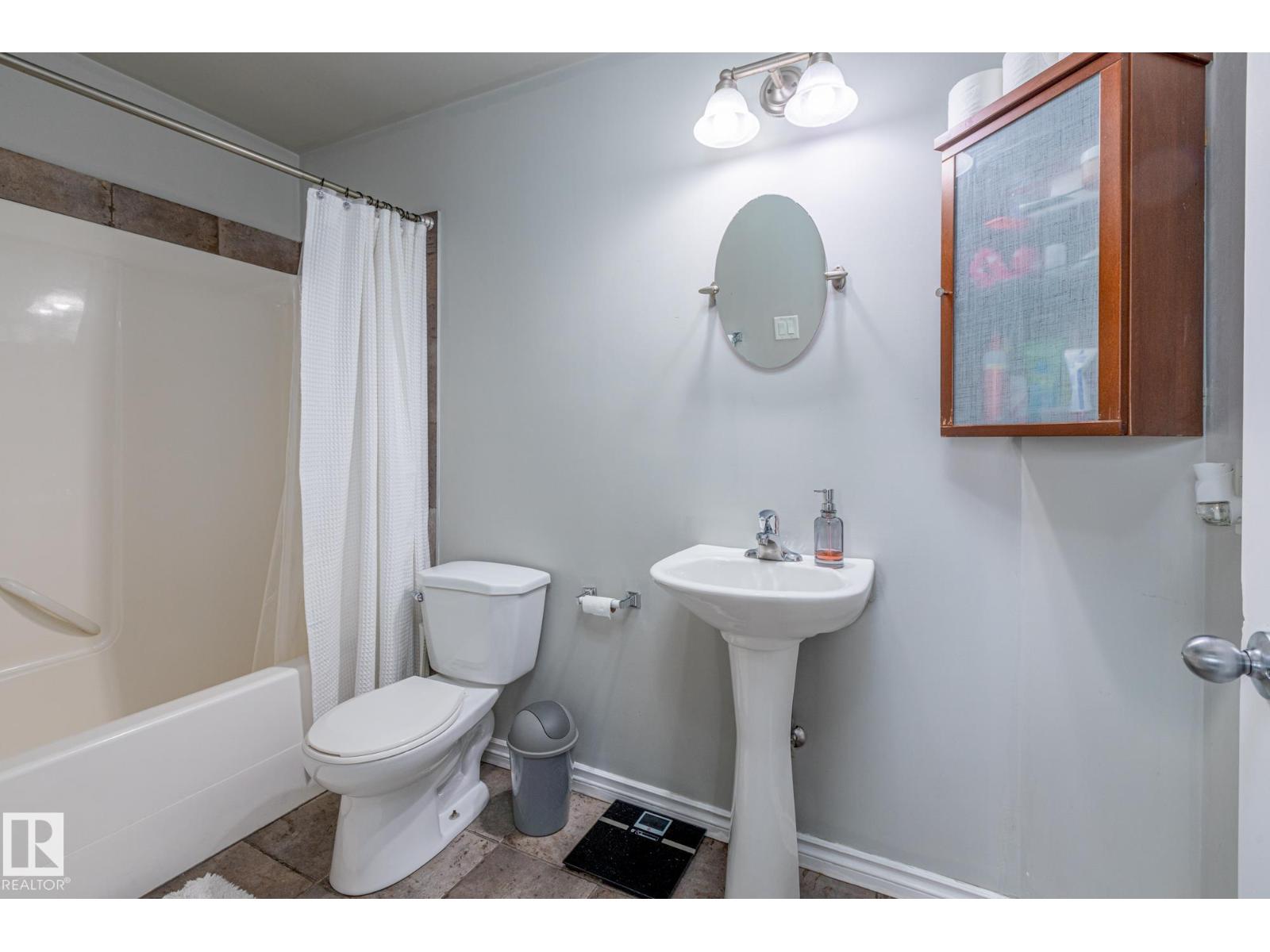 #208 10118 95 ST NW - 23