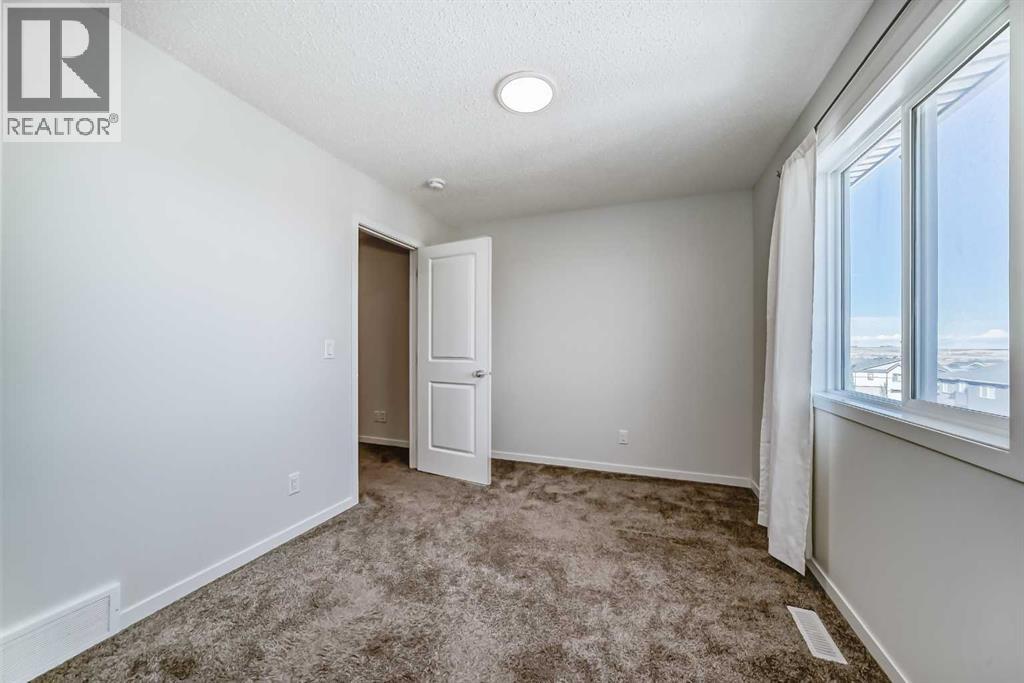 Single Family House for Sale in  Edith Gate NW Glacier Ridge Calgary 