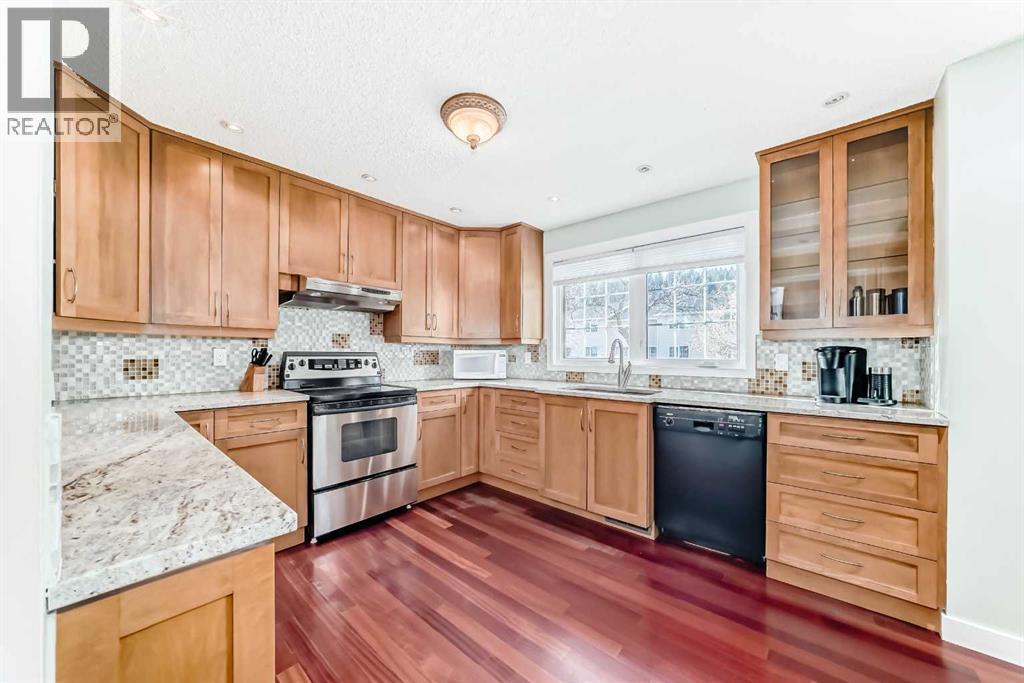 Single Family House 4 Level for Sale in  Point Mckay Gardens NW Point McKay Calgary 