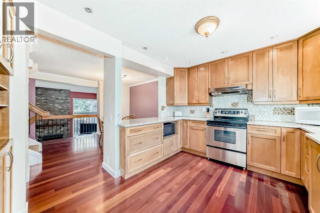 Single Family House 4 Level for Sale in  Point Mckay Gardens NW Point McKay Calgary 