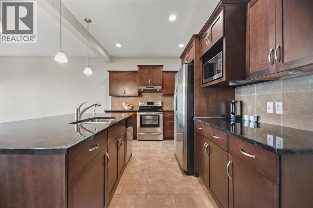 Single Family House for Sale in  Everbrook Way SW Evergreen Calgary 