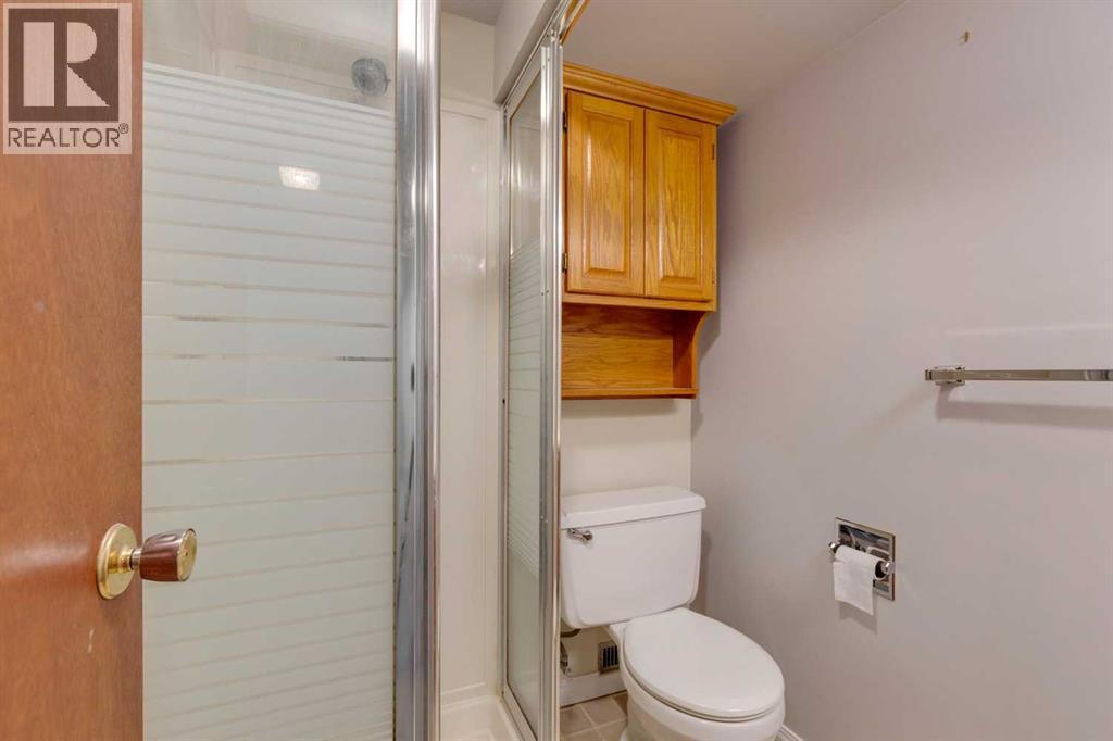 Single Family House Bungalow for Sale in  Woodland Crescent SE Willow Park Calgary 