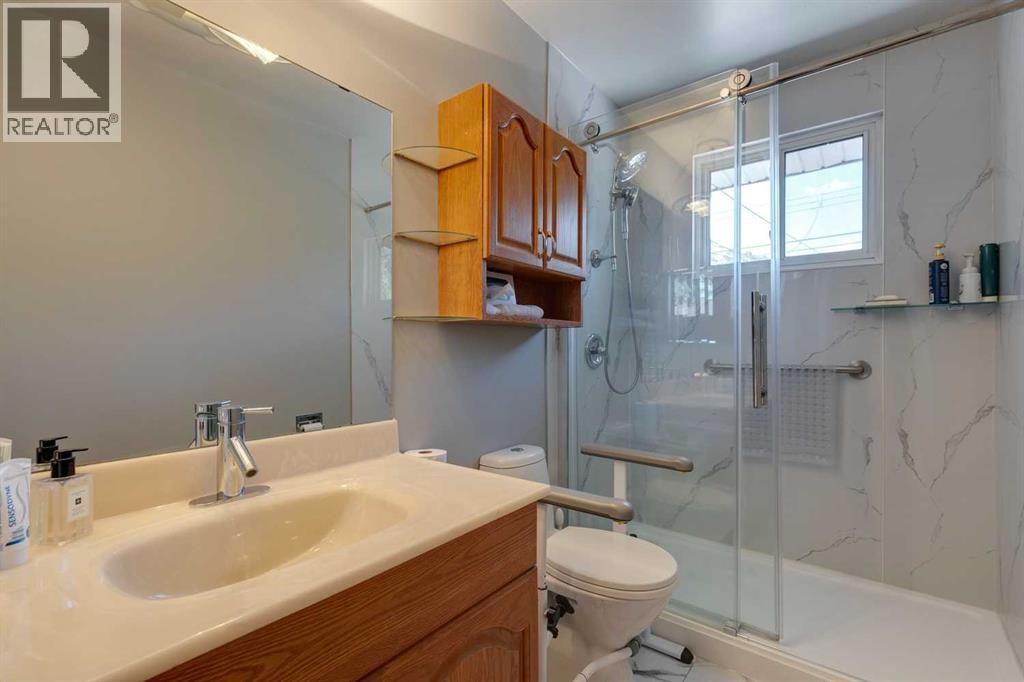 Single Family House Bungalow for Sale in  Woodland Crescent SE Willow Park Calgary 