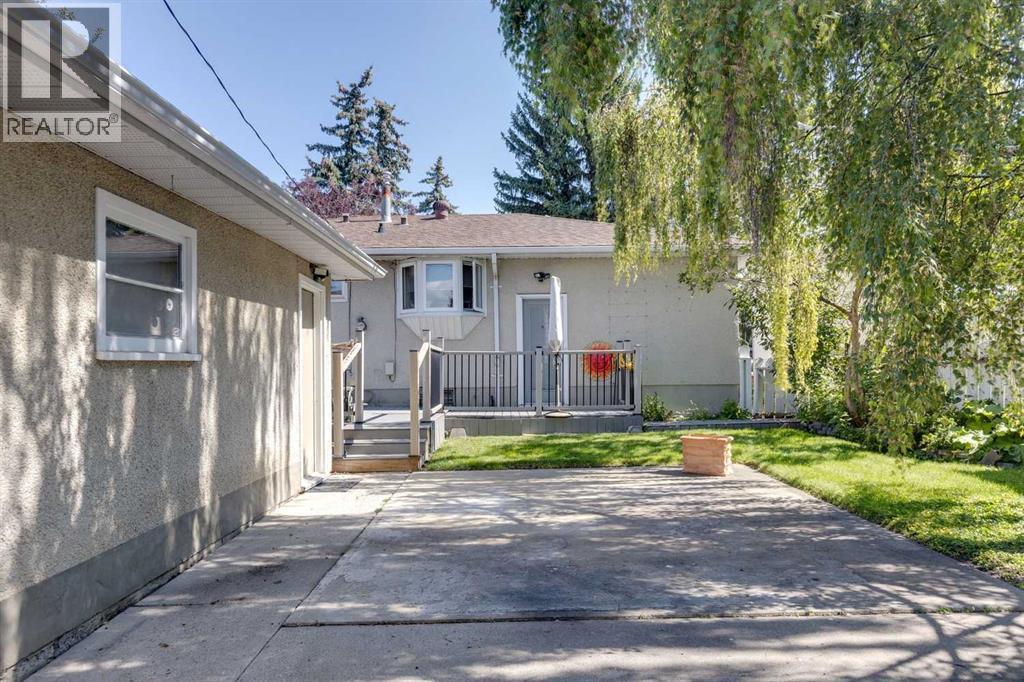 Single Family House Bungalow for Sale in  Woodland Crescent SE Willow Park Calgary 