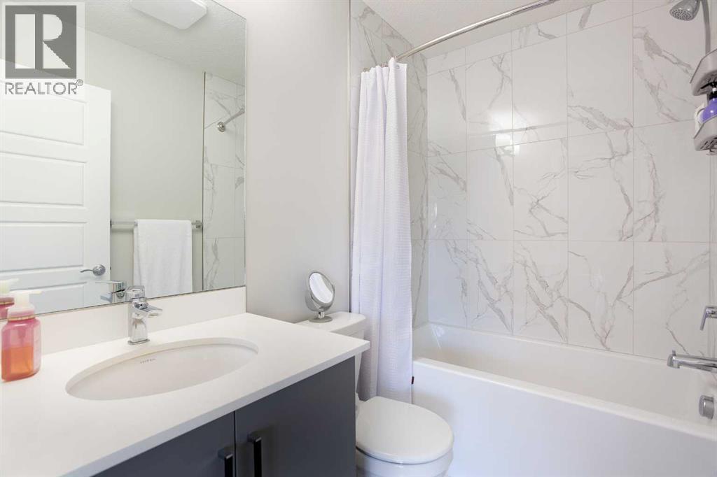 Single Family House for Sale in   Belmont Drive SW Belmont Calgary 