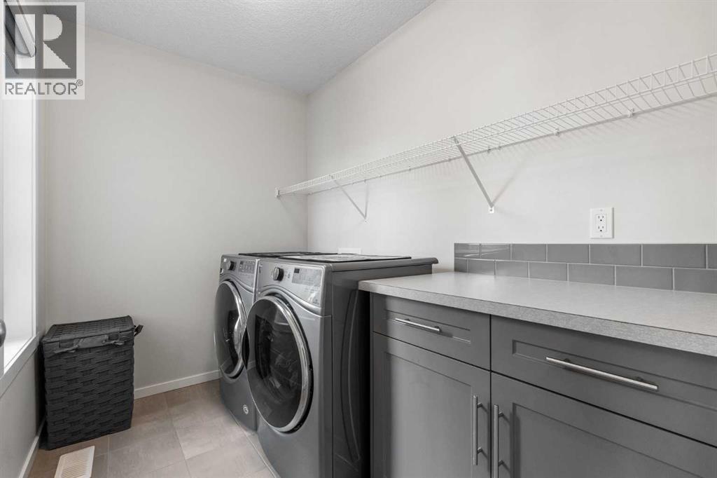 Single Family House for Sale in  Belmont Terrace SW Belmont Calgary 