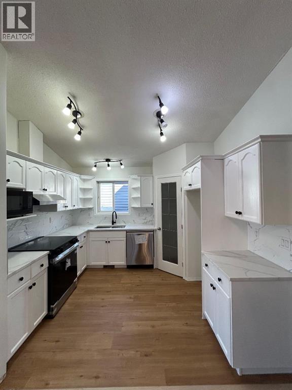 Single Family House Bi-level for Sale in  Tarawood Close NE Taradale Calgary 