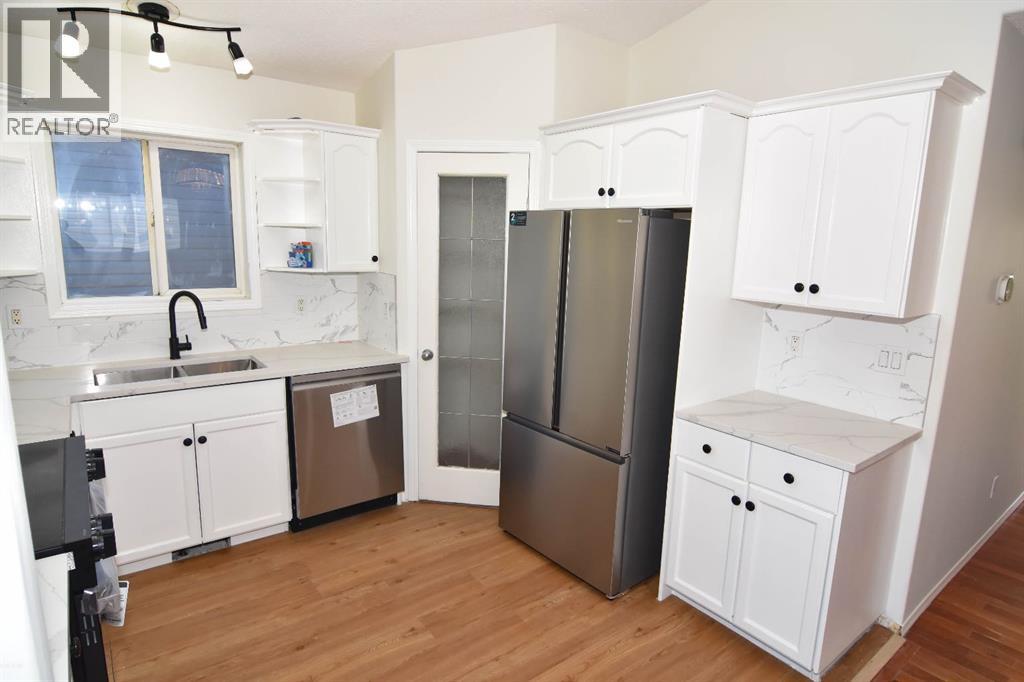 Single Family House Bi-level for Sale in  Tarawood Close NE Taradale Calgary 