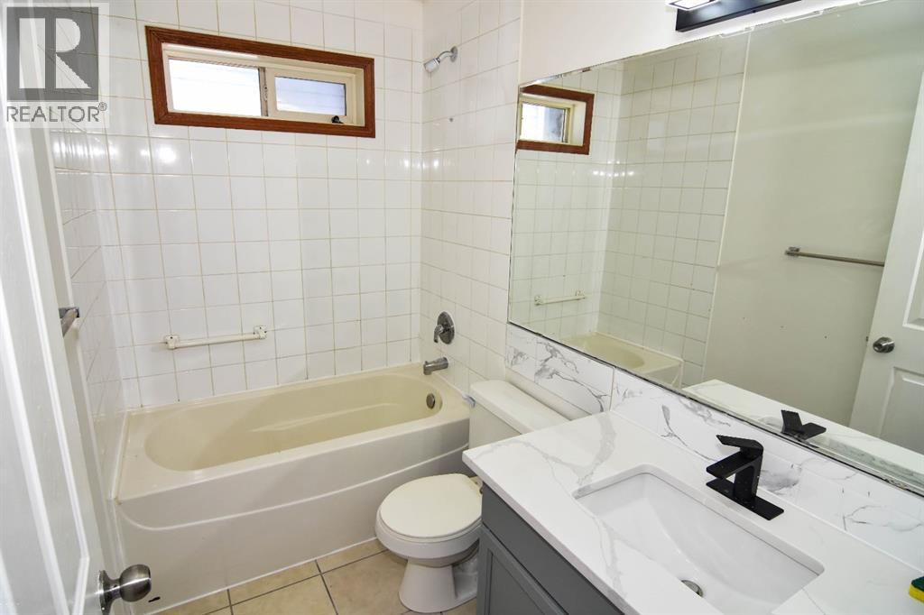 Single Family House Bi-level for Sale in  Tarawood Close NE Taradale Calgary 