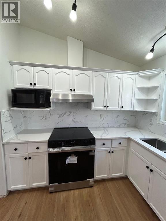 Single Family House Bi-level for Sale in  Tarawood Close NE Taradale Calgary 