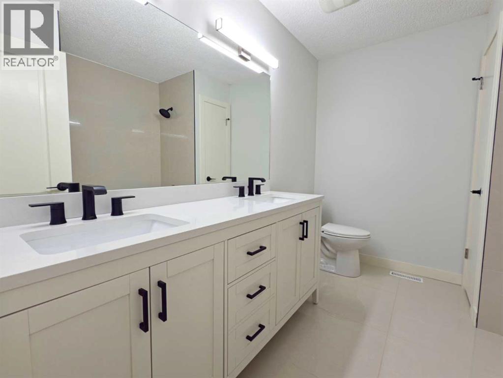 Single Family House Bi-level for Sale in   Street NW Silver Springs Calgary 