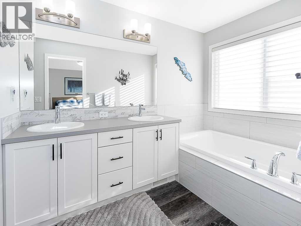 Single Family House for Sale in  Belmont Heath SW Belmont Calgary 