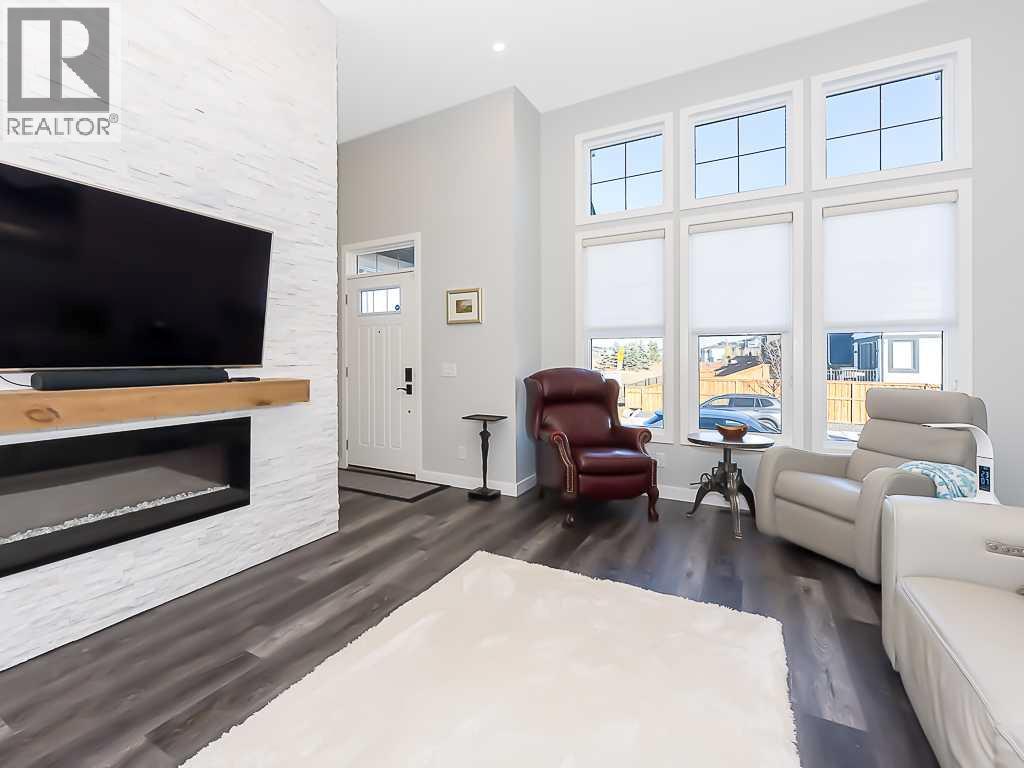 Single Family House for Sale in  Belmont Heath SW Belmont Calgary 