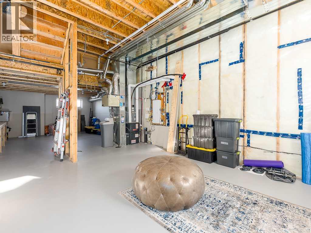 Single Family House for Sale in  Belmont Heath SW Belmont Calgary 