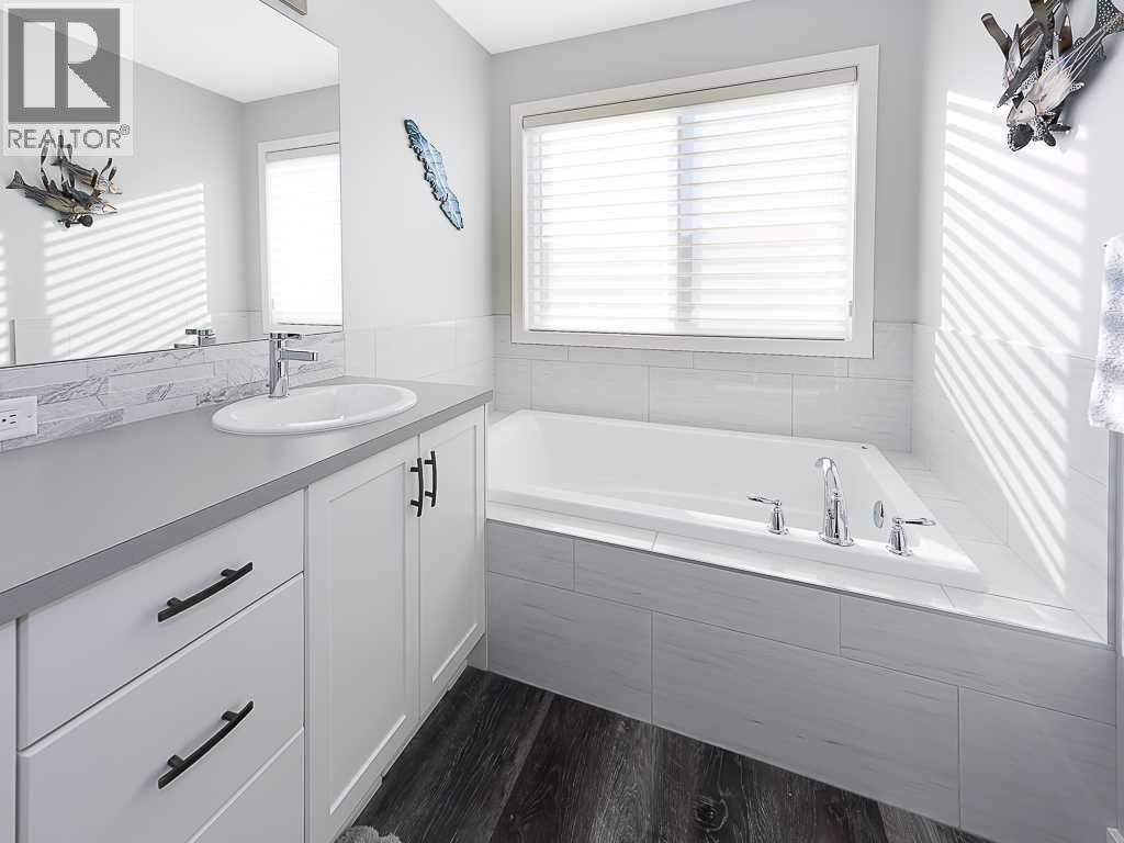 Single Family House for Sale in  Belmont Heath SW Belmont Calgary 