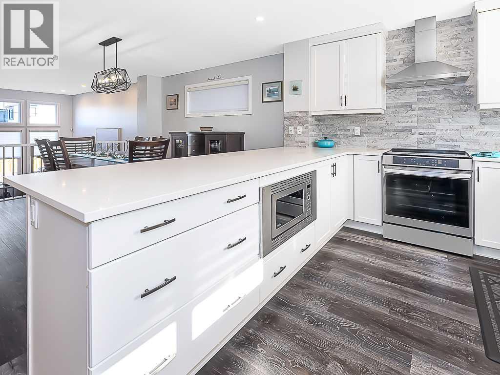 Single Family House for Sale in  Belmont Heath SW Belmont Calgary 