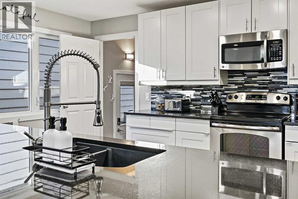 Single Family House Bungalow for Sale in  Midridge Drive SE Midnapore Calgary 