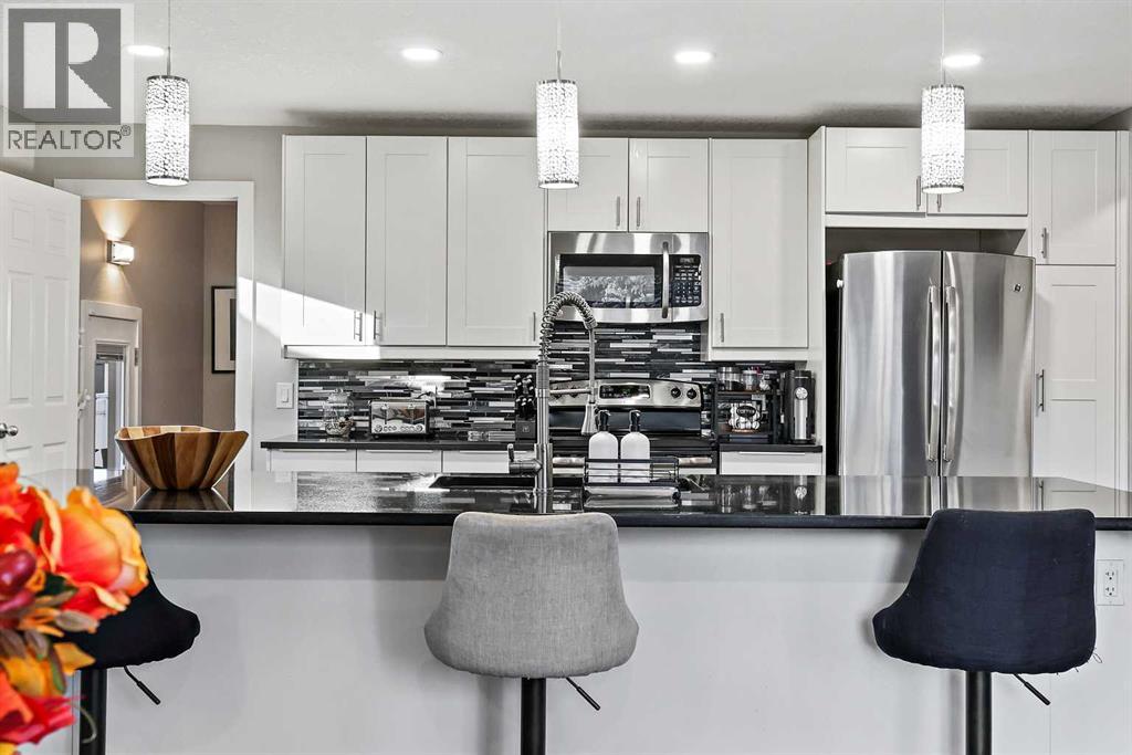 Single Family House Bungalow for Sale in  Midridge Drive SE Midnapore Calgary 