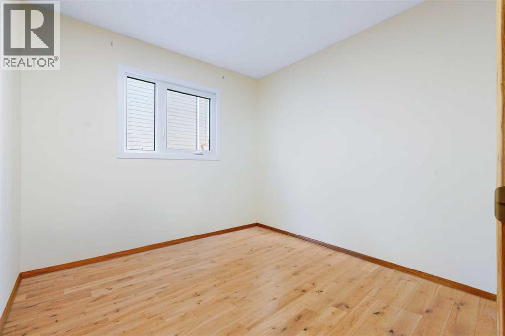 Single Family House Bi-level for Sale in  Macewan Glen Road NW MacEwan Glen Calgary 