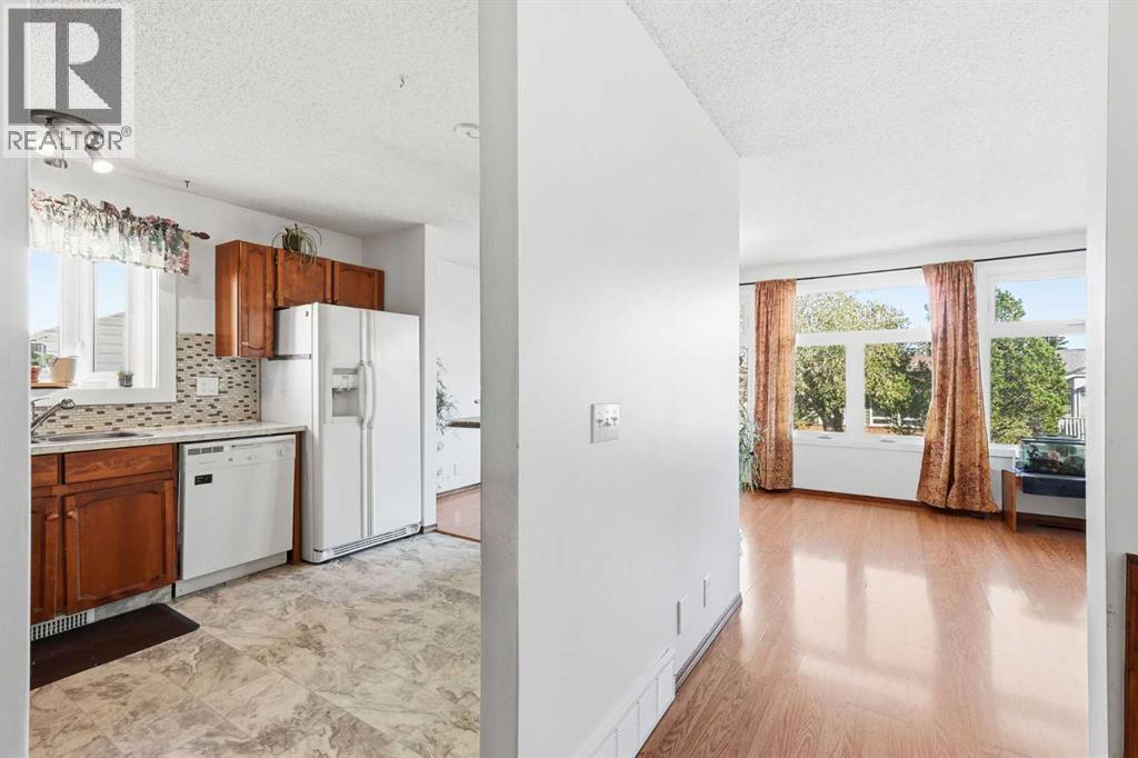 Single Family House Bi-level for Sale in  Macewan Glen Road NW MacEwan Glen Calgary 