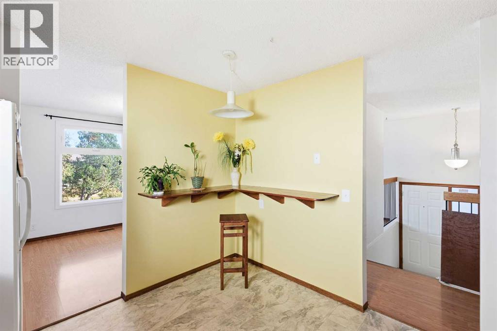 Single Family House Bi-level for Sale in  Macewan Glen Road NW MacEwan Glen Calgary 