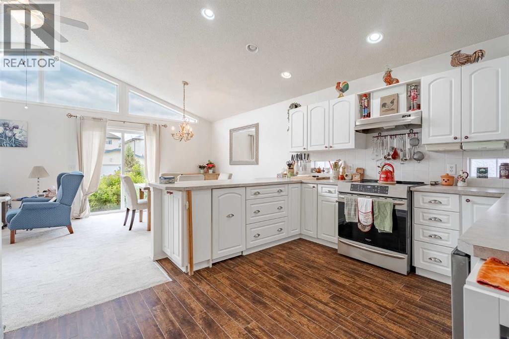 Single Family House Bungalow for Sale in  Everridge Court SW Evergreen Calgary 