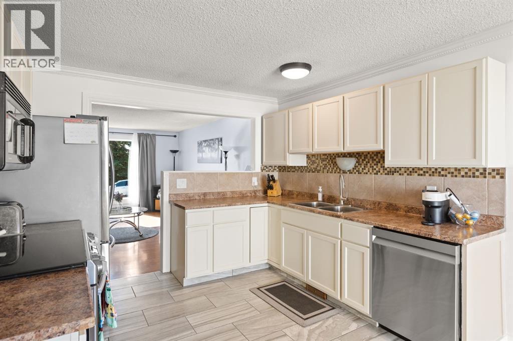 Single Family House Bungalow for Sale in  Erin Park Bay SE Erin Woods Calgary 