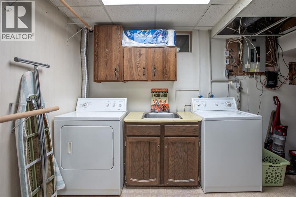 Single Family House Bungalow for Sale in  Erin Park Bay SE Erin Woods Calgary 