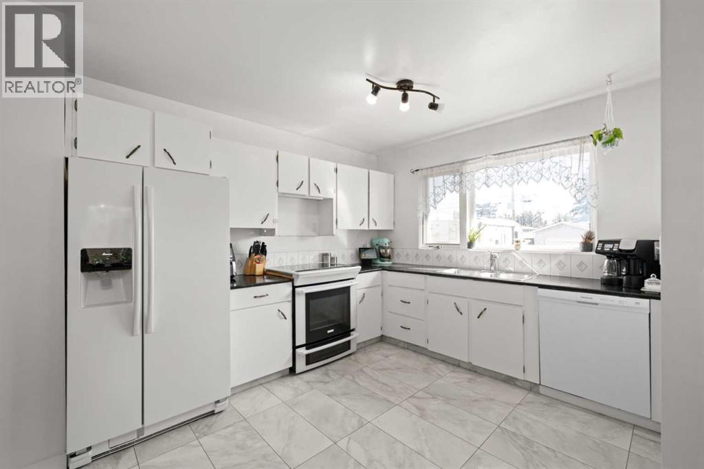 Single Family House Bungalow for Sale in  Marbrooke Circle NE Marlborough Calgary 