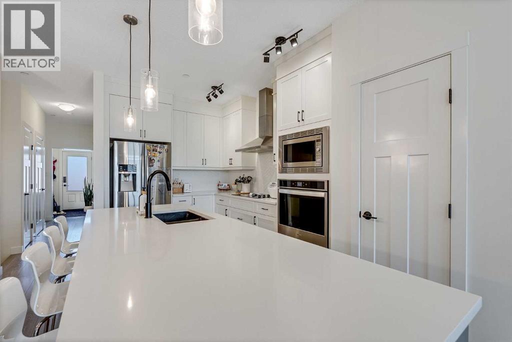 Single Family House for Sale in  Lucas Crescent NW Livingston Calgary 