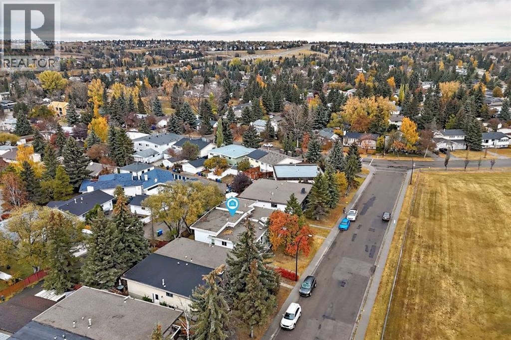 Multi-family House 4 Level for Sale in  &   Street NW Dalhousie Calgary 