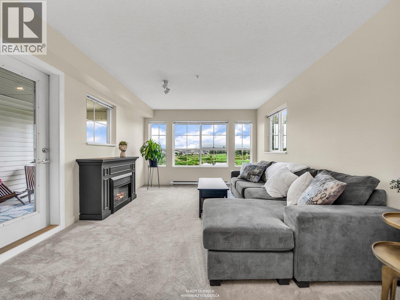 225 19673 MEADOW GARDENS WAY, Pitt Meadows