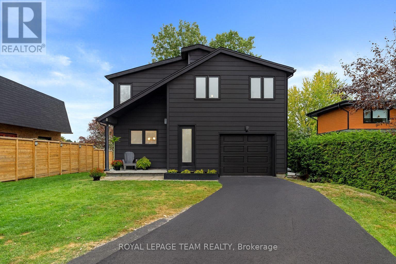 Virtual rendering w modern siding & paved driveway