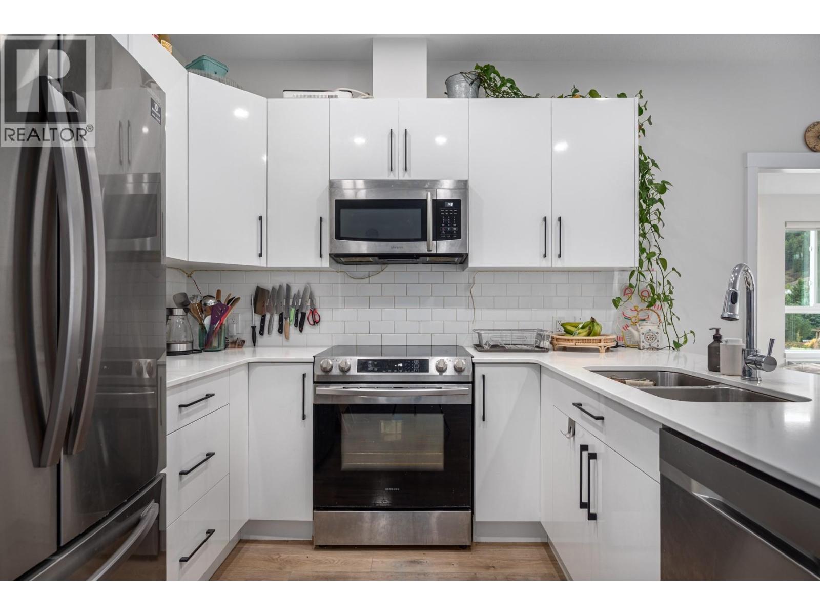 #309 1880 HUGH ALLAN DRIVE - Image 2