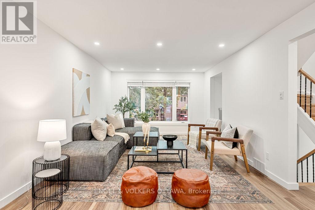 Spacious living room with pot lights throughout