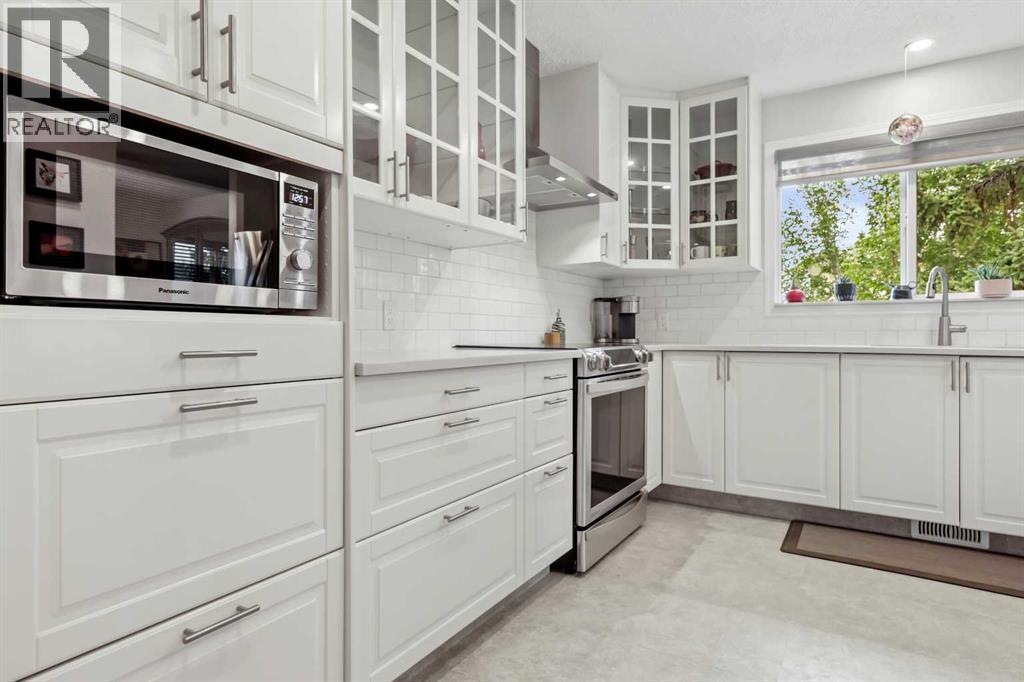 Single Family House 4 Level for Sale in  Sandarac Place NW Sandstone Valley Calgary 