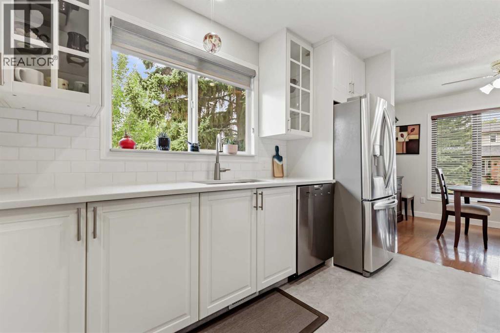 Single Family House 4 Level for Sale in  Sandarac Place NW Sandstone Valley Calgary 