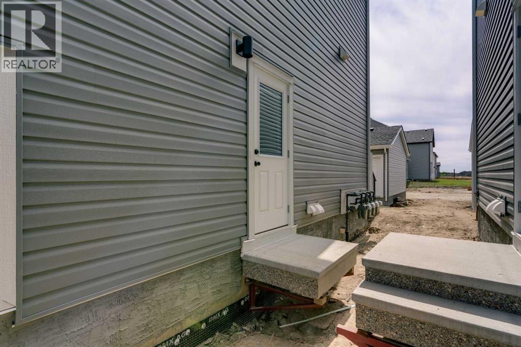 Single Family House for Sale in  Heirloom Way SE Rangeview Calgary 