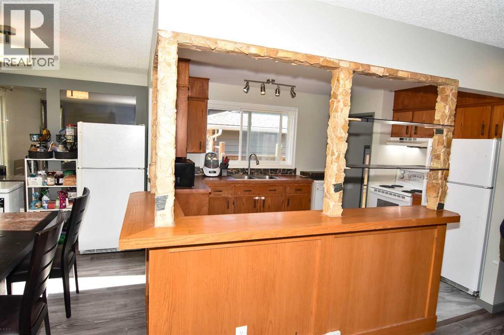 Single Family House Bungalow for Sale in  Woodvale Road SW Woodlands Calgary 