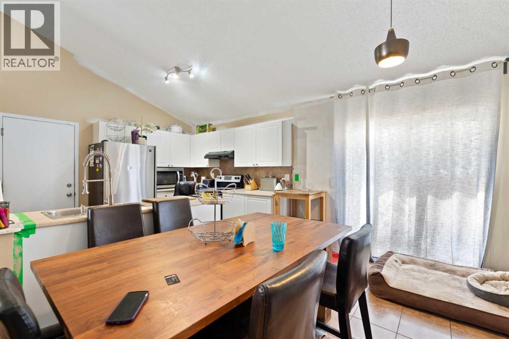 Single Family House 4 Level for Sale in  Mt Apex Green SE McKenzie Lake Calgary 