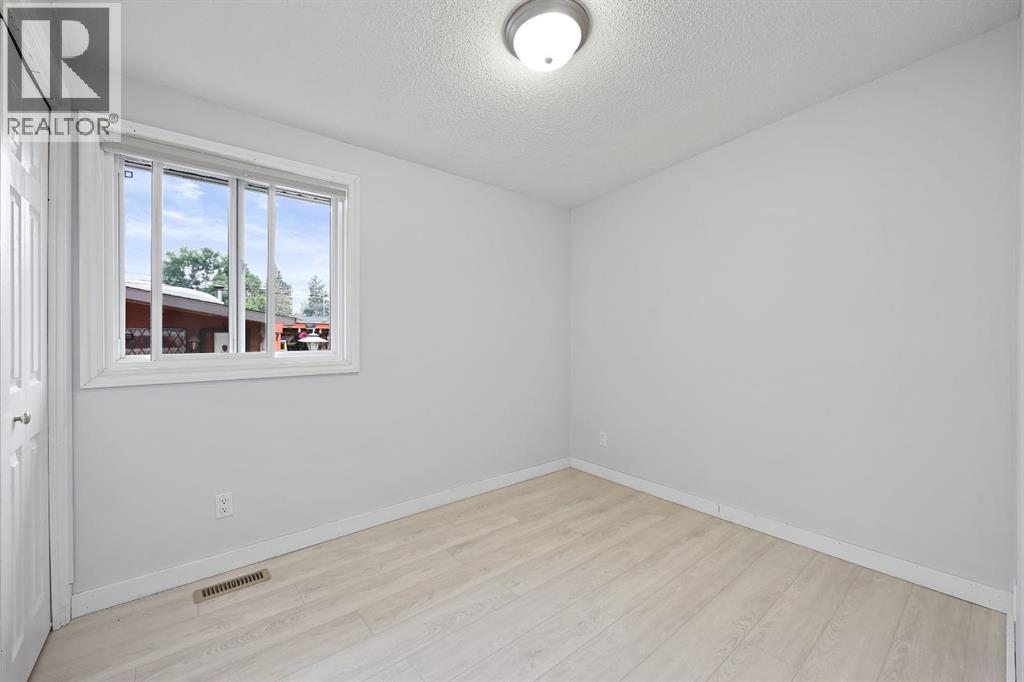 Multi-family House Bi-level for Sale in  &   Avenue NW Bowness Calgary 