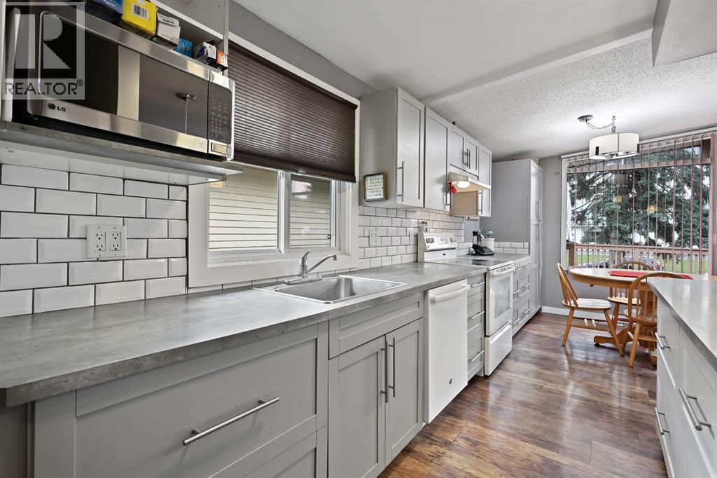 Multi-family House Bi-level for Sale in  &   Avenue NW Bowness Calgary 