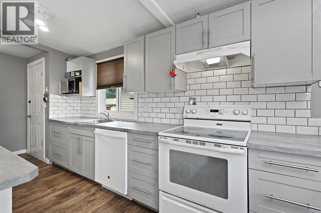 Multi-family House Bi-level for Sale in  &   Avenue NW Bowness Calgary 