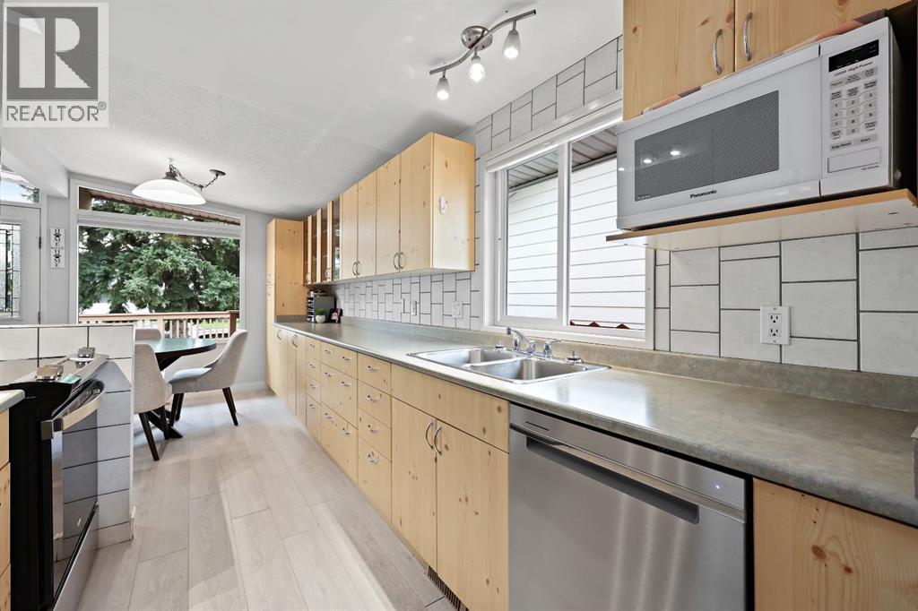 Multi-family House Bi-level for Sale in  &   Avenue NW Bowness Calgary 