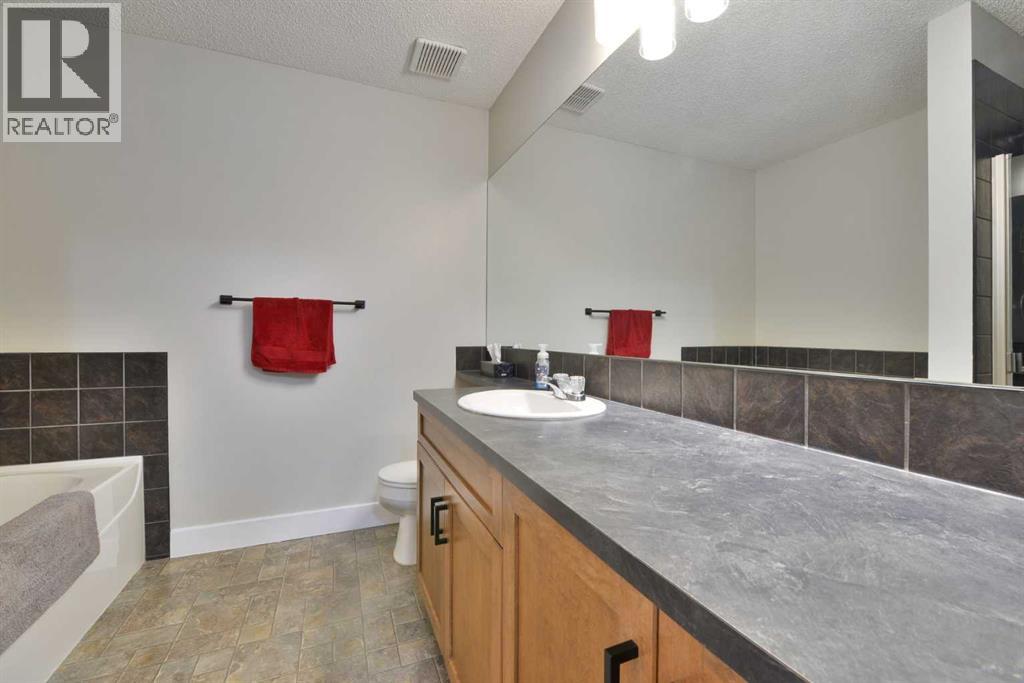 Single Family House Multi-level for Sale in   Village Mews SW Patterson Calgary 